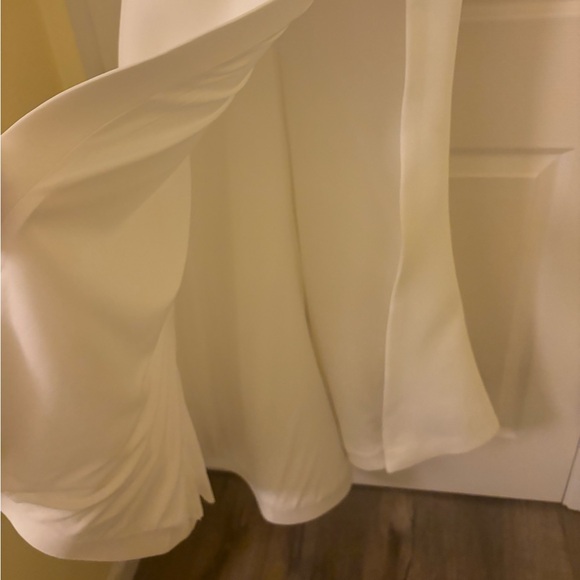 Jovani size 8 Strapless white gown with slit, side bow, and small tail. - Picture 10 of 10